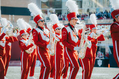 A group of Marching Hundred members playing their instruments.